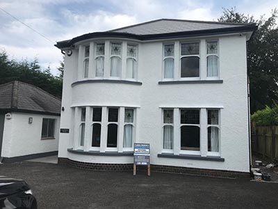 Exterior painting professionals Cardiff detached house after renovation front