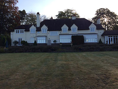 Exterior painting professionals Cardiff large country house back view