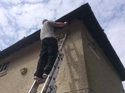 Roofing Experts in Cardiff, Wales Florek Renovations country house renovated roof work in progress painting