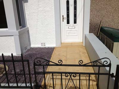 Stone masonry services in Cardiff Florek Renovations front gate with path